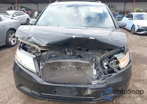 2014 Honda Odyssey Ex-L z USA, uszkodzony, nr VIN 5FNRL5H61EB032128